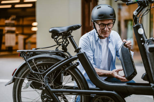 Man preparing e-bike for commute.